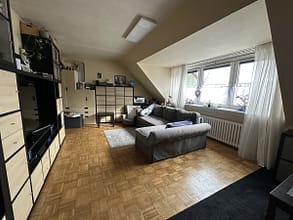 Dachgeschoss Idylle mit drei Zimmern - Wohnzimmer